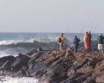 Photo of people fishing on the Charlestown Breachway