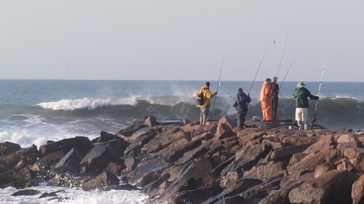 Photo of people fishing on the Charlestown Breachway