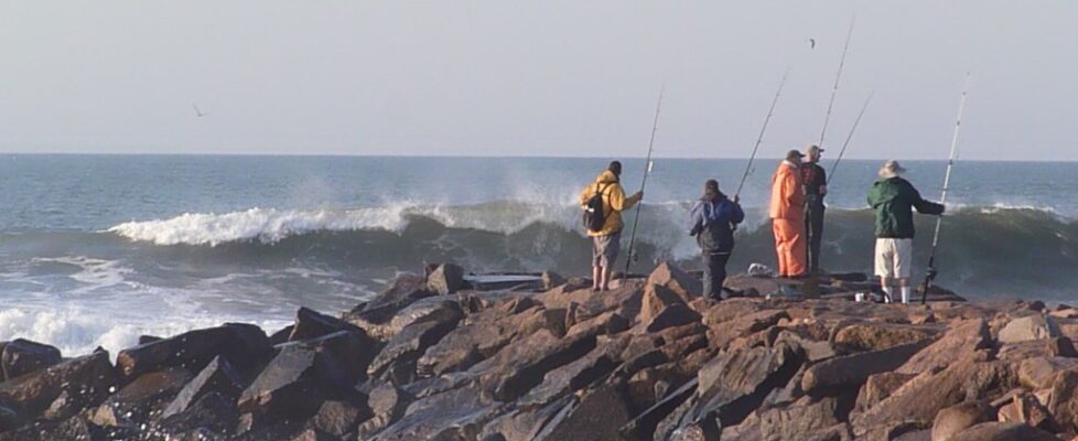 Photo of people fishing on the Charlestown Breachway