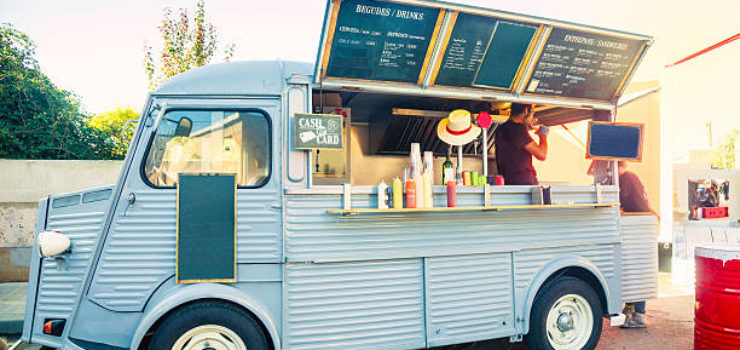 Food truck open and porked in the street