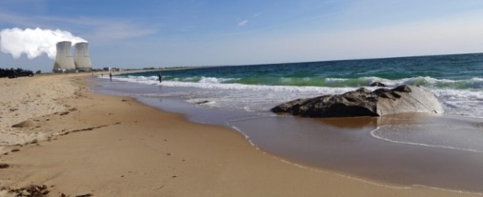 Photo of east beach with proposed nuclear cooling towers in the distance