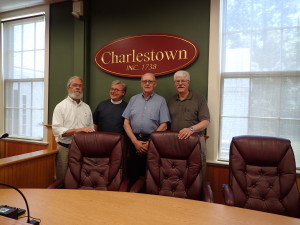 Geoff Marchant, Michael Tessman, Bob Batchelor and Tom Gentz arrive early to Town Hall for the long awaited closing on the ChurchWoods property.