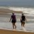 Photo of two women walking on East Beach